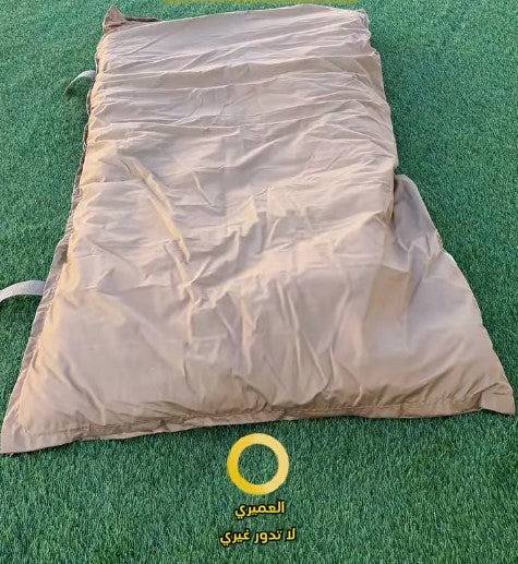 حقيبة نوم وجلسة أرضية 2 في 1