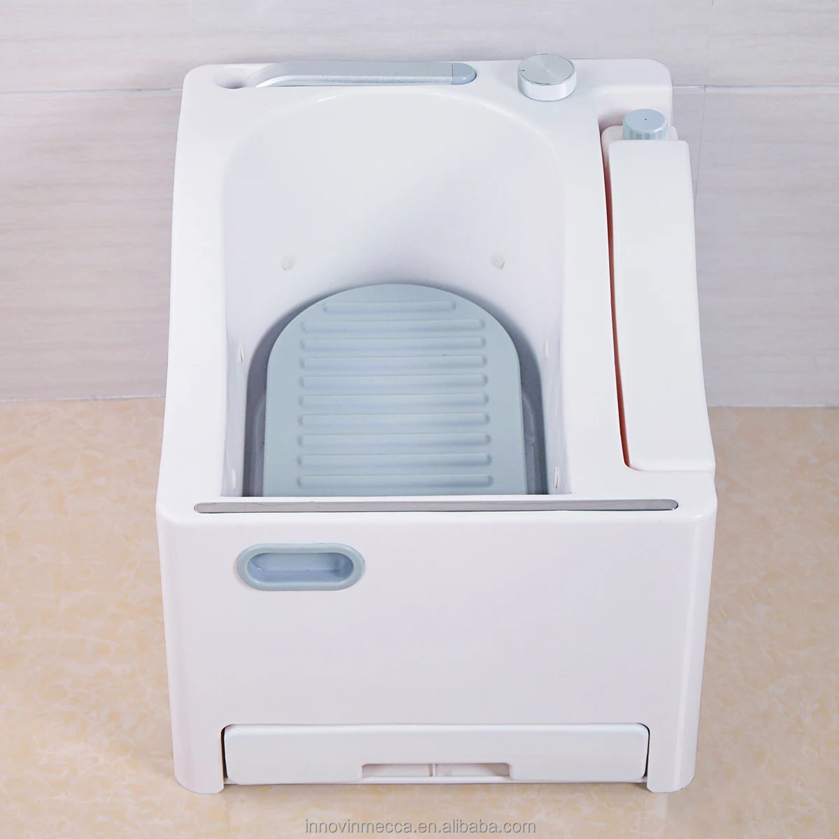 آلة الوضوء المحمولة لغسل اليدين والقدمين والوجه